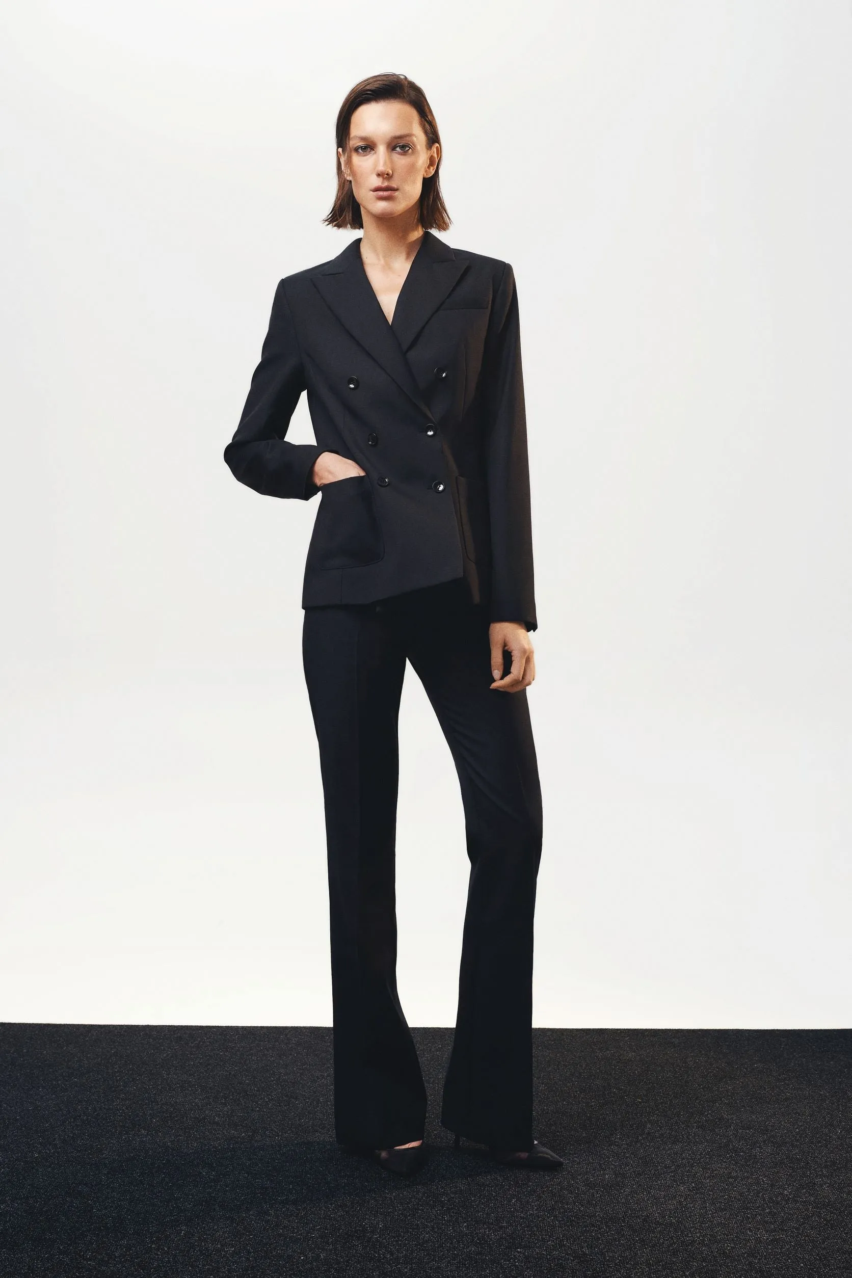 Black woolen flared trousers