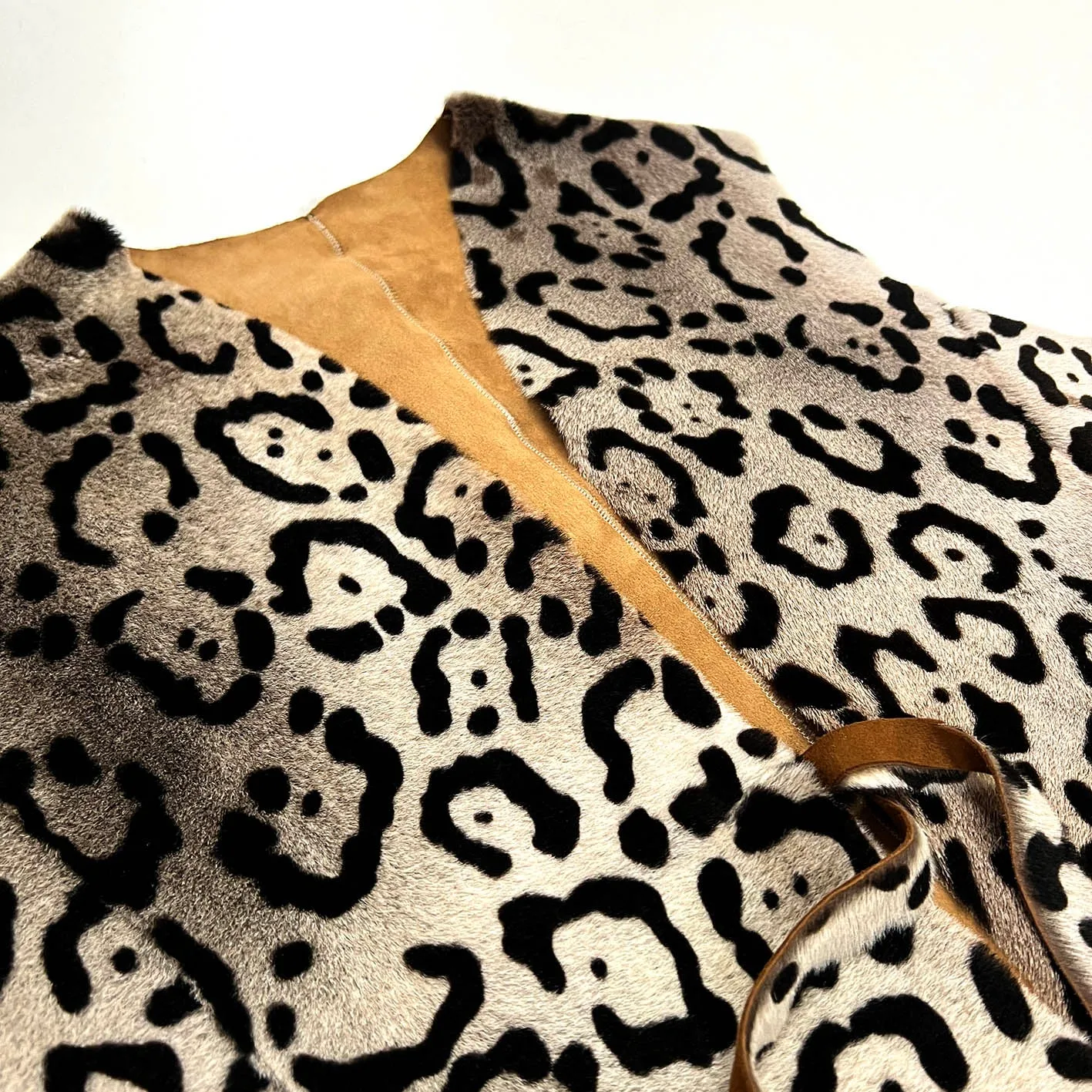 TAIGA Sheepskin Waistcoat - Cappuccino   Black Animal Print / Natural