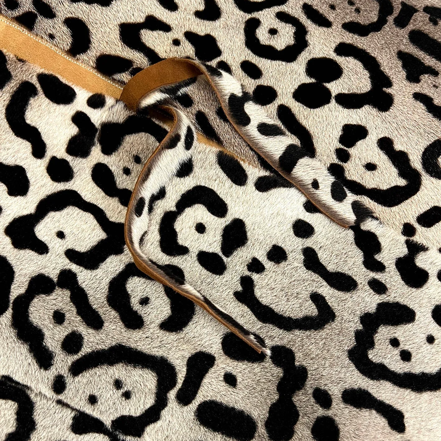 TAIGA Sheepskin Waistcoat - Cappuccino   Black Animal Print / Natural